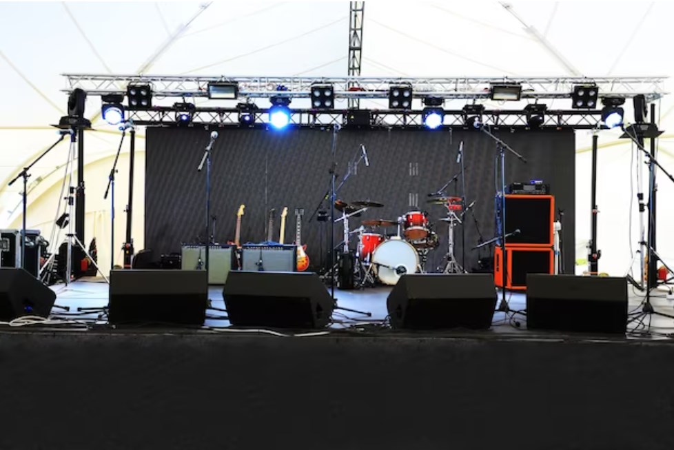 an empty stage before the concert with floodlight and musical instruments