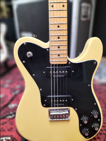 Close-up view of a Squier Telecaster Custom electric guitar