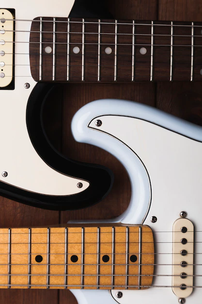 Two guitars with Detailed close-up of the stunning design